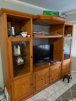 Wooden tv stand with glass shelves