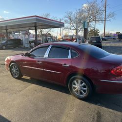 2008 Buick Lacross And 2003 Buick Century 