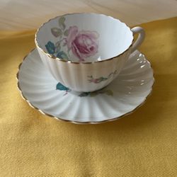 Teacup and saucer that coordinates with Embassy Ware teaset