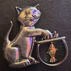 preowned in excellent condition Cherokee Cat and Fish Bowl Brooch Pin, Silver Color located off lake mead and Simmons area asking $7