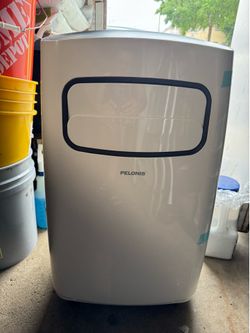 PELONIS  PORTABLE AIR CONDITIONER 12000 BTU NEW NEVER USED