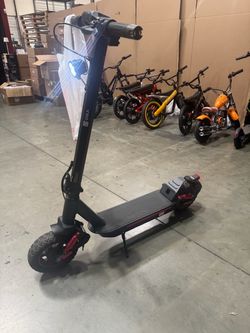 Front and rear shock-absorbing electric scooters