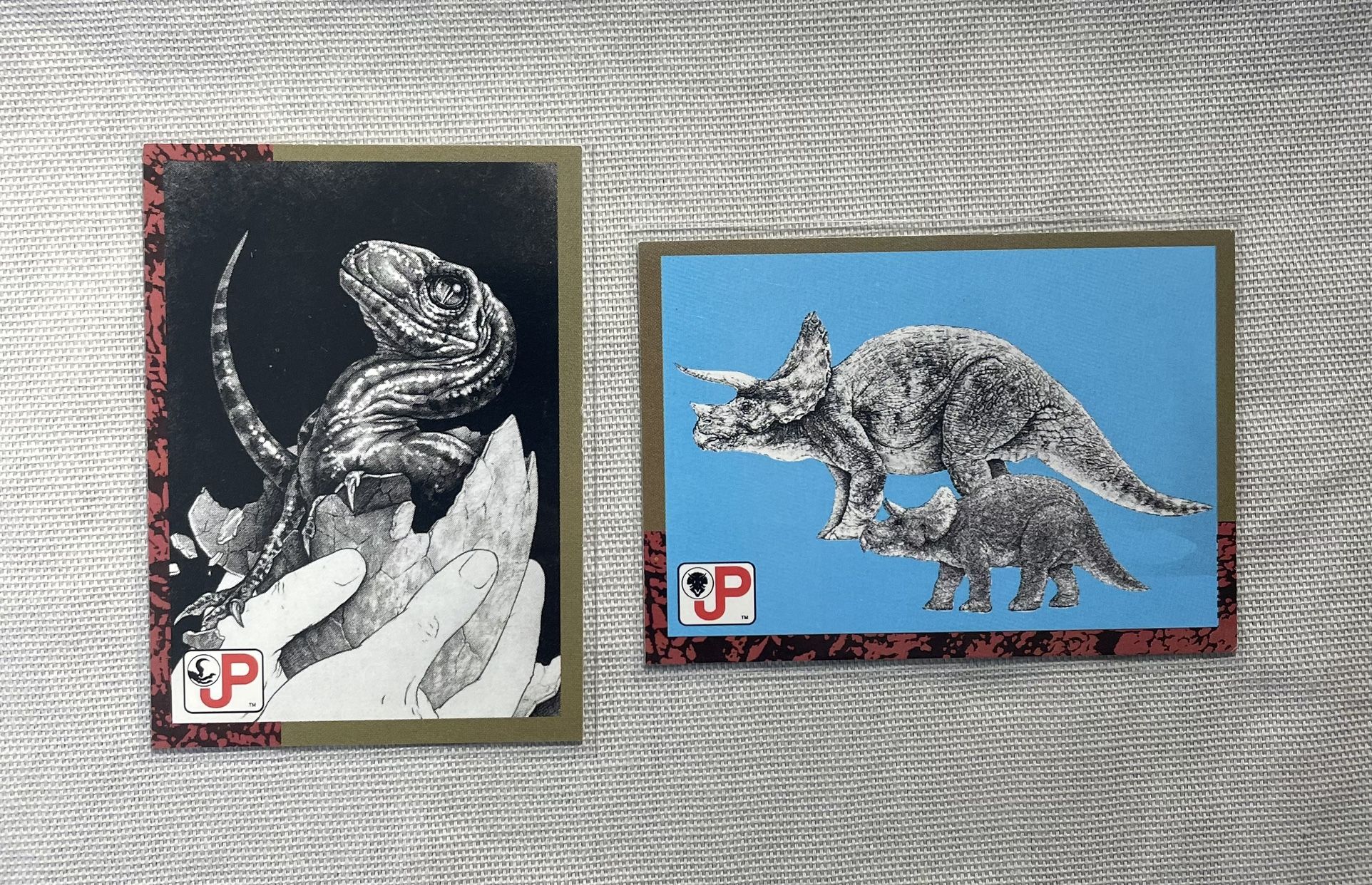 π₯β€οΈπ¦ 1993 Jurassic Park (2) Card Lot - Topps Trading Cards - The Art of CRASH - Rapter Hatchling and Triceratops π¦β€οΈπ₯