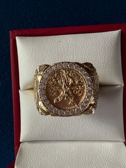 Gold ring 10K size 12 900 I'm asking for that but I accept offers it has a two-year warranty