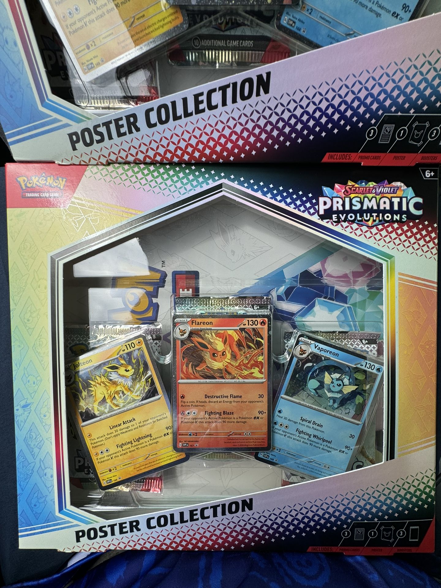 Pokemon Prismatic Evolutions Poster Collection boxes