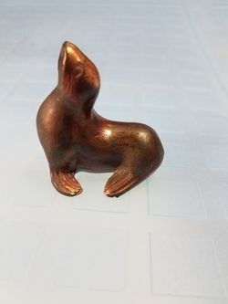 Copper seal figurine
