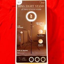 NEW 10" ring light stand 4 ft tripod & phone holder  
Price is negotiable open to offers 