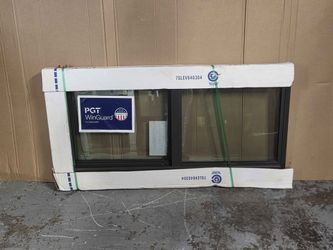 Brand New 47.5W x 22.5H PGT Impact Aluminum Sliding Window