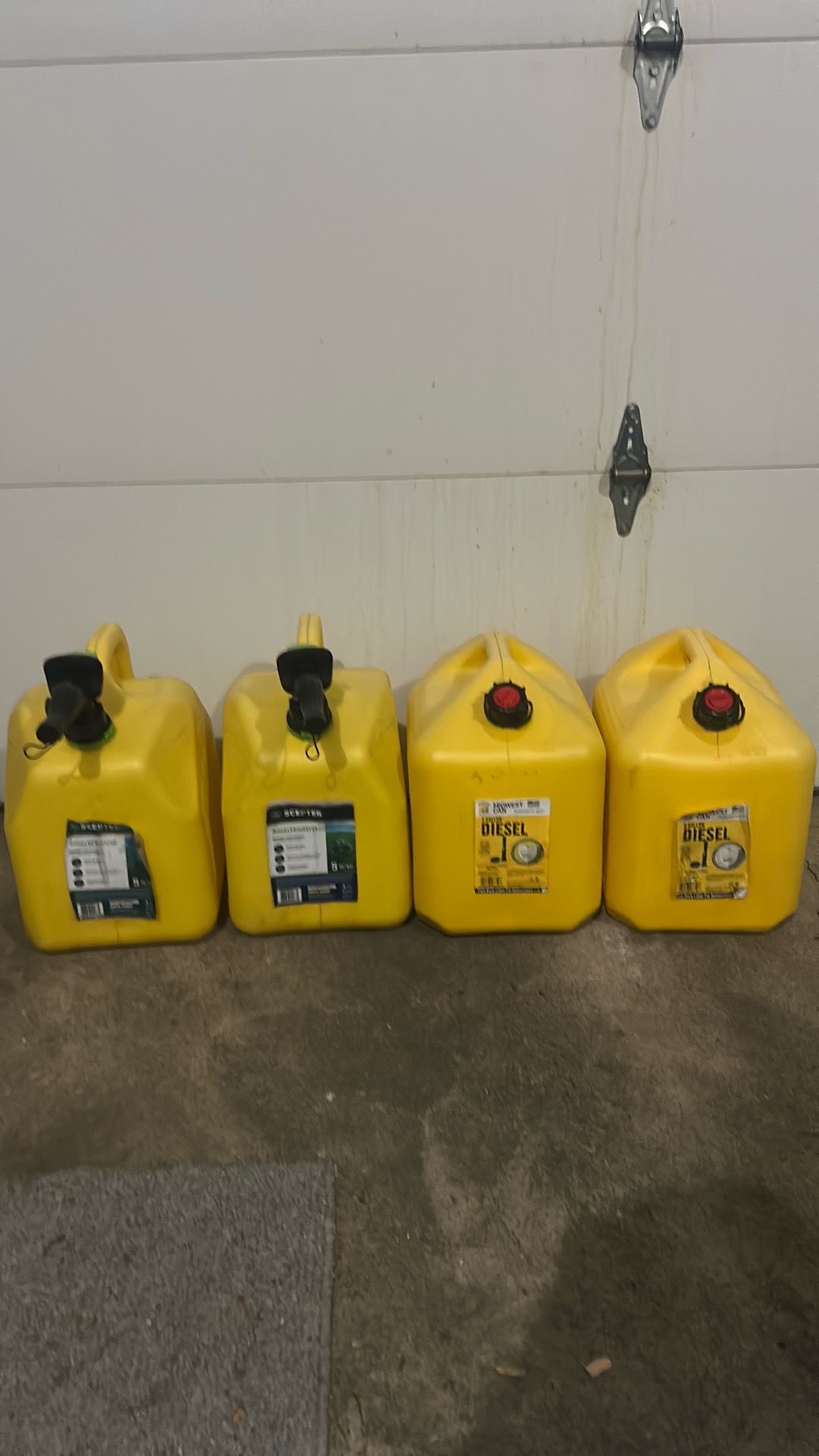 Four 5gal diesel Containers