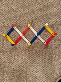 Expandable Wall Coat Rack with Colorful Pegs