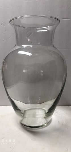 Home/special occasions decor, 13 inch tall clear glass sweetheart vase, with 6 inches mouth opening, 4 inches bottom.  $10