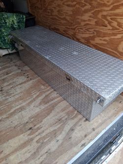 TrailFX aluminum diamond-plate crossover truck tool box. Heavy-duty, full-width single-lid design with plenty of storage for tools and equipment Empty
