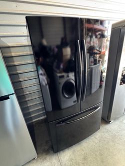 Black color Samsung Refrigerator French 3 Door ice maker  dimensions are 69 height 35 7/8 width 32 depth working great. Extra for delivery. same day d