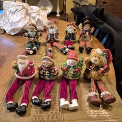 Eight vintage sitting christmas ceramic figurines