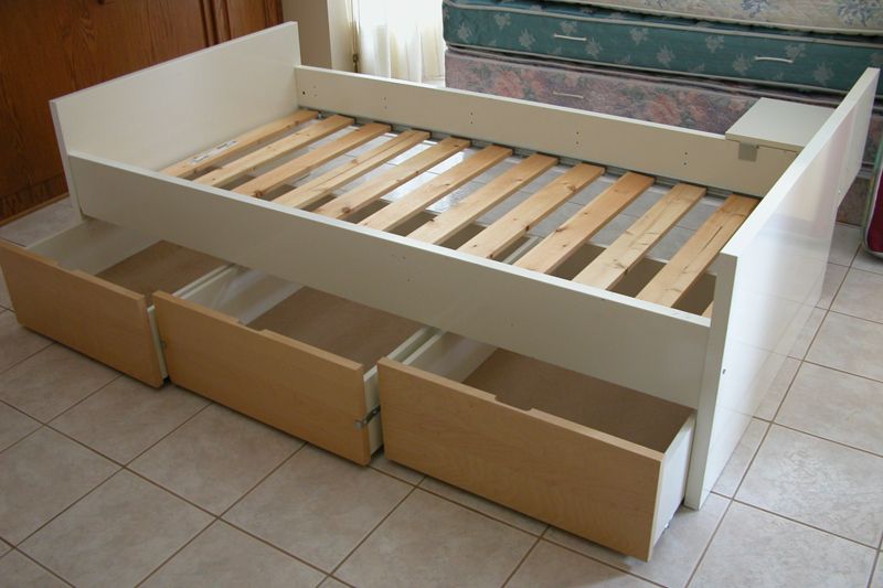 IKEA twin bed with 3 storage drawers and mattress