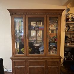 Amazing China Hutch. Just being used for storage so rather it go to someone who will use it. In amazing condition. Stuff inside will be taken out. Dim