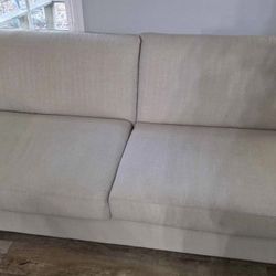 Barely used beige couch.