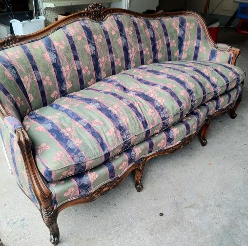 Upholstered antique couch - $1,200