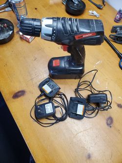 3/8 Drill. With Battery And Two Chargers
