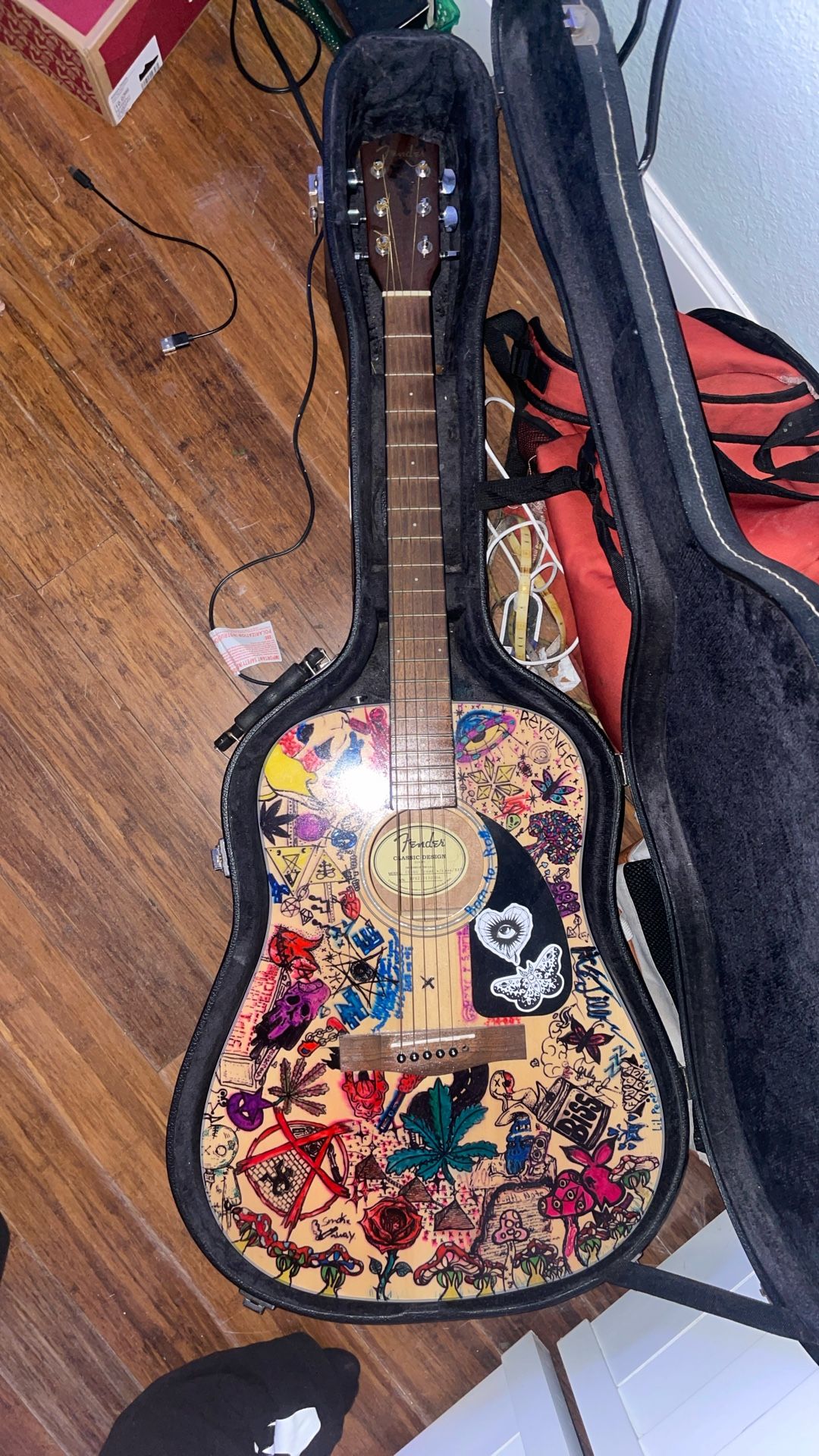Fender Acoustic Guitar ( comes with the case and capo)