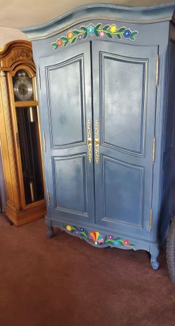 Blue Painted Wood Armoire with Floral Details