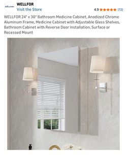 24” X 30” Bathroom vanity mirror Retails $326