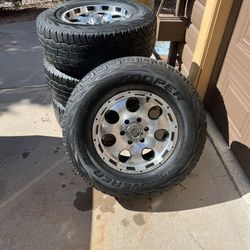 4 Cooper Tires An Black An Chrome Wheels $300