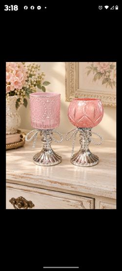 Elegant Pink glass and silver candle holders