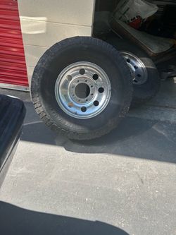 4- ford 16inch rims with tires
