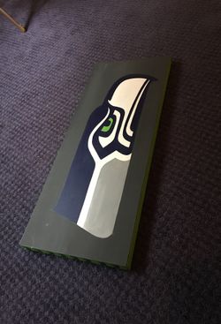 Hand painted Seahawks logo on canvas.