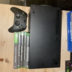 Xbox series X with game in controller