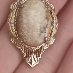 Rose Gold Charm With A Nice Stone Inlay