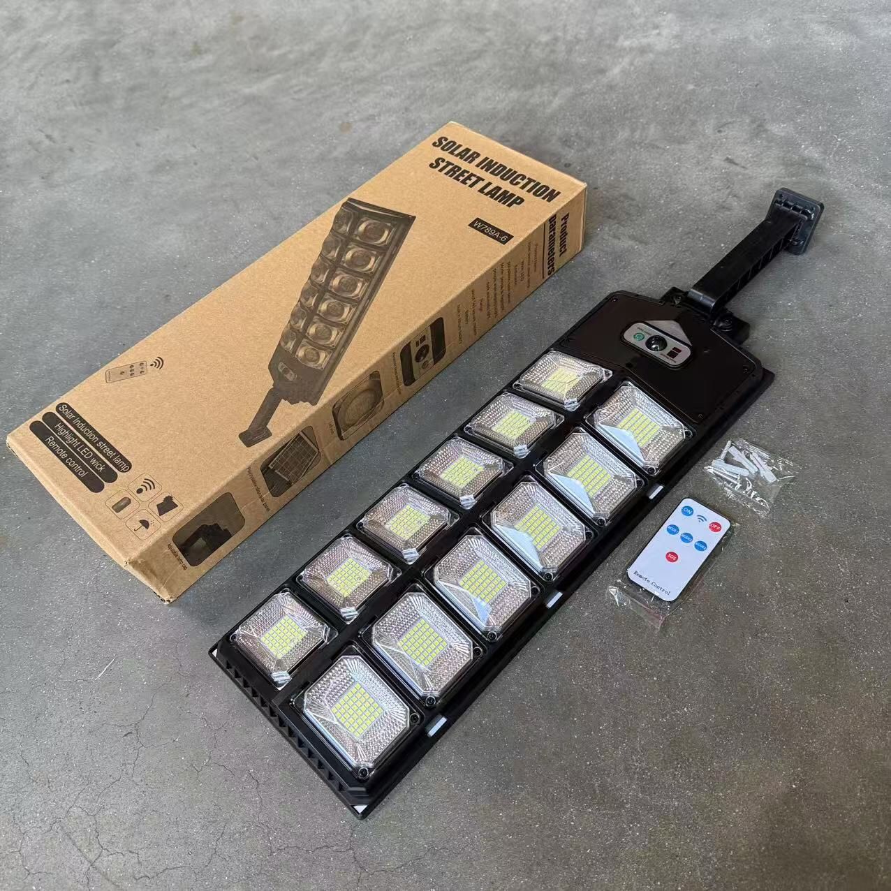 New In Box 24x7 Inch Wall Mounter Motion Sensor Security Spotlight Street Light LED With Solar Panel And Remote