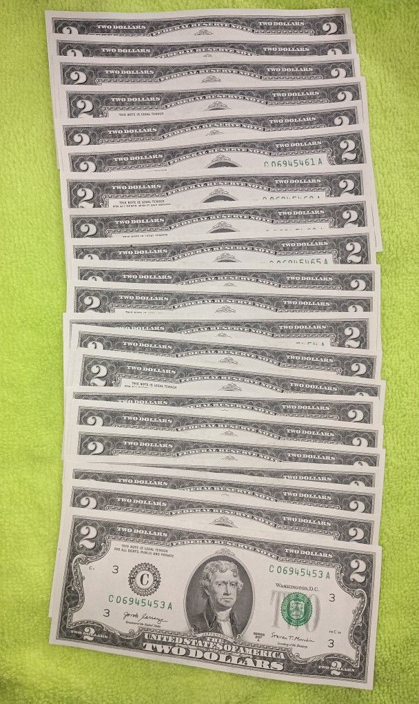 21 uncirculated $2 Bills.