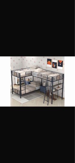 3 bed bunk bed with a desk as well