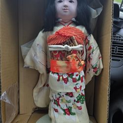 Oriental Porcelain Doll 