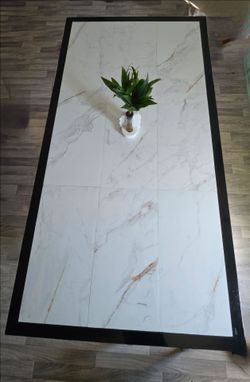 Metal table with ceramics