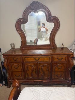 Solid wood king sized bed with mattress, dresser/ and mirror