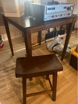 Bar height table and four barstools