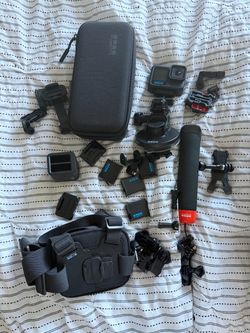 GoPro HERO13 Black + 4 Batteries + Handler + Genuine GoPro Accessories