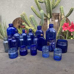 Lot of 20 cobalt blue antique bottles