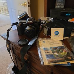 Minolta 35 Mm Camera And Accessories And Owners Manuel