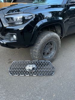 Toyota Tacoma grill with emblem