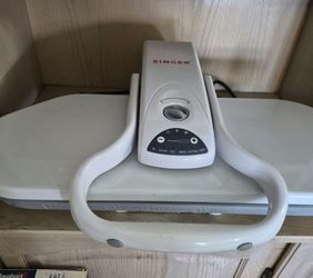 Singer steam press