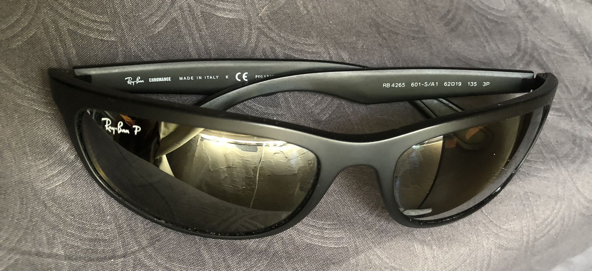 Ray-Ban / RayBan Model#: RB 4265 601-S/A1, “Chromance” Matte Black Polarized Black Lenses w/ Scuff On L-Side Lens