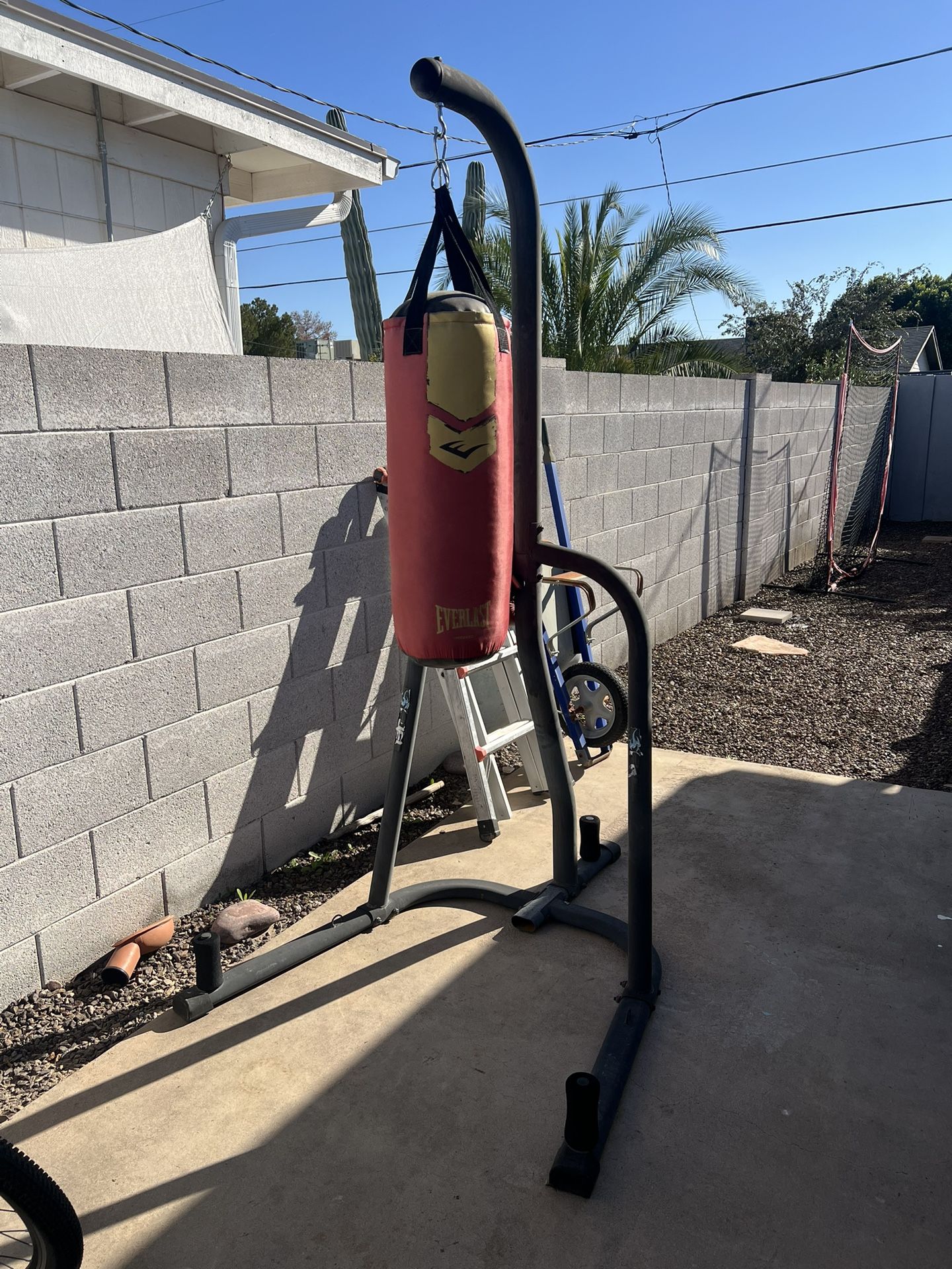 Used 50lb Heavy bag With Stand & Gloves 