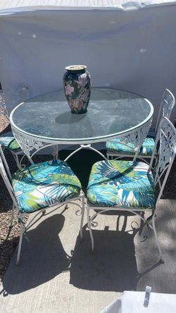$125 Roth iron table and chairs 4 two glass tops