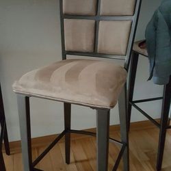 Four 30" contemporary microfiber stools.