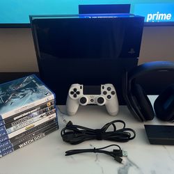 PlayStation 4 500GB with 8 Games & Headset $120 OBO