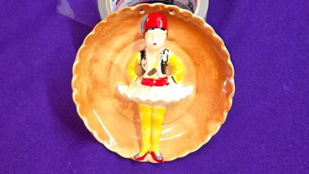 Vintage Kitschy 3D Ceramic Wall Hanging Plate from August 1947,  Featuring a Dancing Figure in Yellow and Red Attire. M1B016